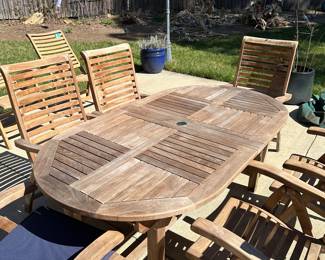 R58 - $1250. Teak Patio Table with *10* adjustable chairs. Table has 2 butterfly leaves stored inside. Needs a little muscle to pull apart. 4 chairs have been stored inside and look brand new. The 6 that were outside have been covered but the bottom of the feet are dirty and weathered (just need cleaned up!) All sturdy. Table is 39" wide x 73" long. Chairs are 24" wide.