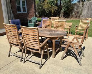 R58 - $1250. Teak Patio Table with *10* adjustable chairs. Table has 2 butterfly leaves stored inside. Needs a little muscle to pull apart. 4 chairs have been stored inside and look brand new. The 6 that were outside have been covered but the bottom of the feet are dirty and weathered (just need cleaned up!) All sturdy. Table is 39" wide x 73" long. Chairs are 24" wide.