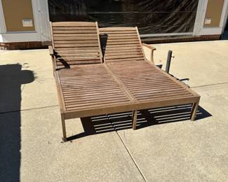 R57 - $450. Teak Double Chaise. Measures 61" wide x 80" long. Has been stored covered but there is a little dirt around the feet. Each side adjusts separately! Cushions are still useable.