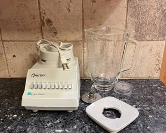 R76 - $30. Vintage Osterizer Blender. Never used. Removed from box for photos.