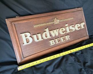 Actual wood frame. Center panel is metal painted to look like wood. Needs rewiring.