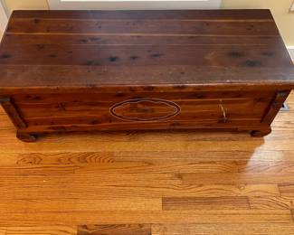 C30 - $60. Lane Cedar Chest. Measures 48" x 19" x 17" tall. Has some minor surface damage and legs have been repaired but overall very good condition!
