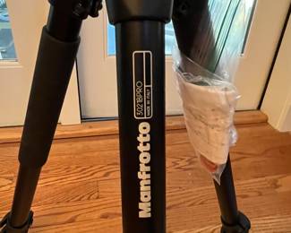 C45 - $40. Manfrotto 3021B Pro Tripod w/ elbow bracket. 