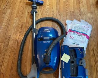 C93 - $100. Kenmore Intuition Canister Vacuum with extra filters. 