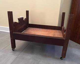 C6 - $40.  Hand made Mahogany Doll Bed. Made in the 1950s. Needs a piece of foam for a replacement mattress! Measures 29” wide x 22” deep x 22.25” tall