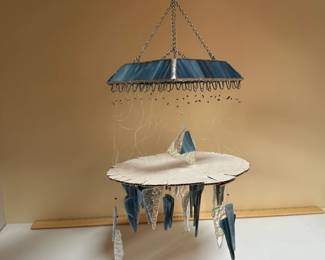 C68 - $40. Stained Glass Wind Chimes - on cardboard so they don't get tangled. 