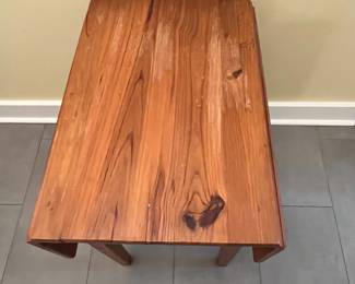 C9 - $35. Small Pine Side Table. Leaves down it measures 17” wide x  24” deep x 26 tall. Each leaf adds 7.25".