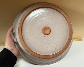 C57 - $25. Pottery Bowl with floral pattern. 