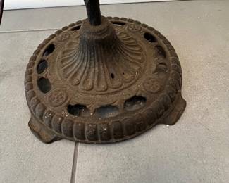 C25 - $40. Iron Floor Lamp. Probably needs rewired. Measures 56.5" tall. Has ship design on the top arm. 