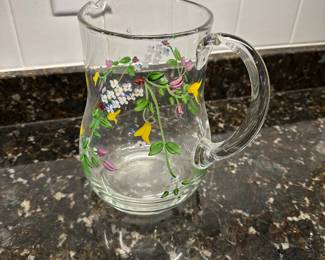 C99 - $20. Handpainted glass pitcher. 