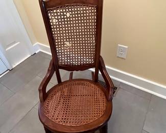 C5 - $40. Single Caned Antique Childs Rocking Chair (from the mid 1800s). Seat is in very good condition - Back has holes. Measures 19” wide x 29.25”deep x 34.25” tall 