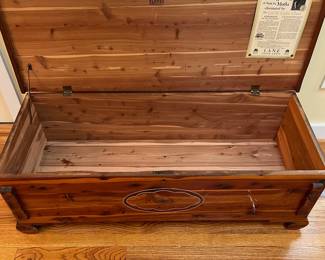 C30 - $60. Lane Cedar Chest. Measures 48" x 19" x 17" tall. Has some minor surface damage and legs have been repaired but overall very good condition!