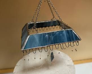 C68 - $40. Stained Glass Wind Chimes - on cardboard so they don't get tangled. 