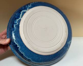 C56 - $15. Signed Pottery Pie Plate. 