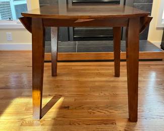 C15 - $75. Kitchen Table with small drop leaves. Leaves down it measures 42.25” wide x 30” deep 30.5” tall. Each leaf adds 7.25". 