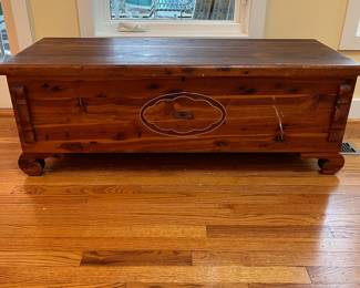 C30 - $60. Lane Cedar Chest. Measures 48" x 19" x 17" tall. Has some minor surface damage and legs have been repaired but overall very good condition!