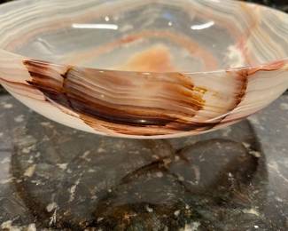 C35 - $30. Hand Carved Onyx Bowl. Measures 10". 
