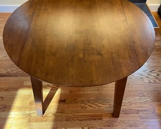 C15 - $75. Kitchen Table with small drop leaves. Leaves down it measures 42.25” wide x 30” deep 30.5” tall. Each leaf adds 7.25". 