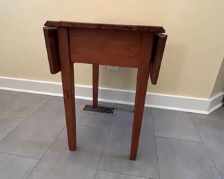 C9 - $35. Small Pine Side Table. Leaves down it measures 17” wide x  24” deep x 26 tall. Each leaf adds 7.25".
