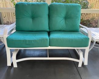 Glider Loveseat. Measures 54" long x 29" deep x 37" tall. 