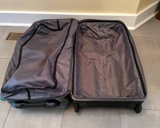 C75 - $40. Gray & Teal Eddie Bauer Expedition 26 Rolling Duffel Bag. In very good used condition. Zippers all work - lots of storage. 