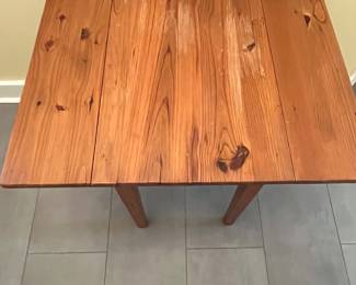 C9 - $35. Small Pine Side Table. Leaves down it measures 17” wide x  24” deep x 26 tall. Each leaf adds 7.25".