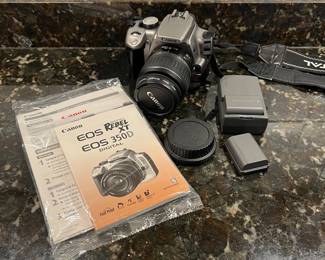 C41 - $30. Canon EOS Rebel XT 350D. Includes charger & batteries. Untested. 