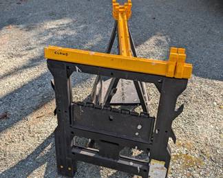 C108 - $25 PAIR of folding plastic sawhorses. 