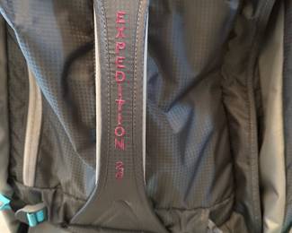 C75 - $40. Gray & Teal Eddie Bauer Expedition 26 Rolling Duffel Bag. In very good used condition. Zippers all work - lots of storage. 