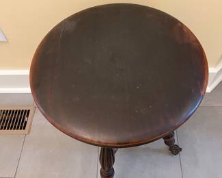 C10 - $65. Piano Stool with glass feet. Adjustable height. Seat Measures 14.75” wide x 19” tall all the way down. Seat is 2 layers and needs glued back together. 