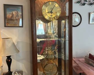 Grandfather Clock with glass shelves  final price $300 Runs perfect 