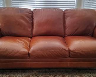$300 LEATHER SOFA (SLIGHT WEAR SEE PICS)