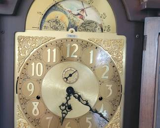 $350 STUNNING TREND GRANDFATHER CLOCK Movement by Trend. Circa1970’s. Longcase cabinetry, Brass dial and door mounts. Fluted pilasters. Glass sides. Original blue and gold Trend label inside door.