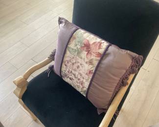 Pillow $3 on black velvet chair $50