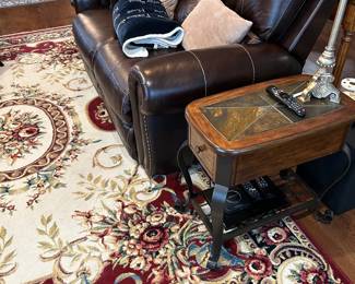 Leather loveseat, side tables.