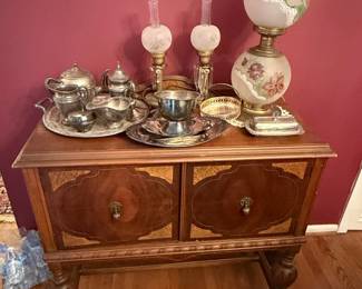Victorian Style Parlor Cabinet with Oil Lamps and Silver-Plated Tea Service