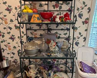Green Metal 3-Tier Bakers Rack with Assorted Kitchenware and Decorative Items