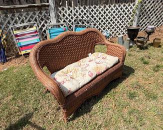 Vintage Wicker Loveseat with Floral Cushion