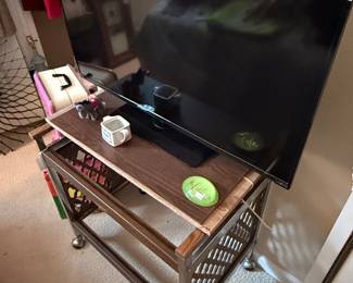 Vizio 55-inch Smart TV on a Vintage-Style Rolling Cart