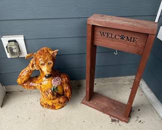 Whimsical Ceramic Dog Holding Flower Statue with Wooden Welcome Sign