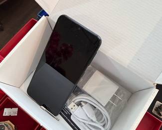 Black Smartphone with Charger and Cable