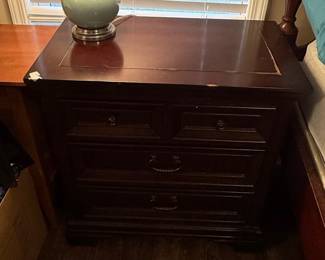 Haverty’s Dark Wood Nightstand with Three Drawers