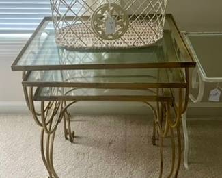 Stacking metal tables with glass tops