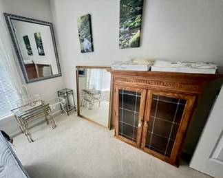 Two large beveled mirrors, Metal glass top tables, hutch top