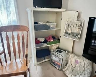 white cabinet, more bedding