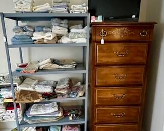 more linens, dresser, tv