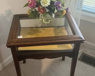 smalll glass enclosed table
