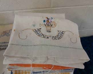 Several vintage linen dish towels