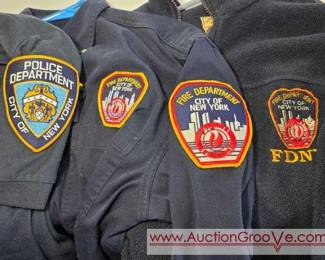 1 New York Police Department and Fire Department Shirts with Patches. Added Goodview Minnesota Police Patch