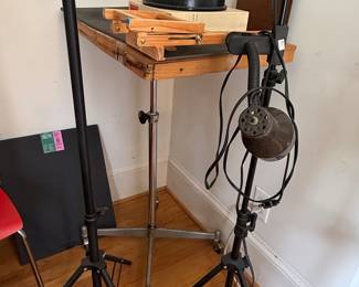 Vintage Photography Lighting and Easel Setup with Film Reel